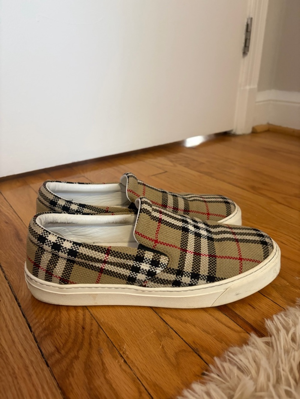 Burberry Beige Plaid Slip-On Sneakers with Red and Black Accents